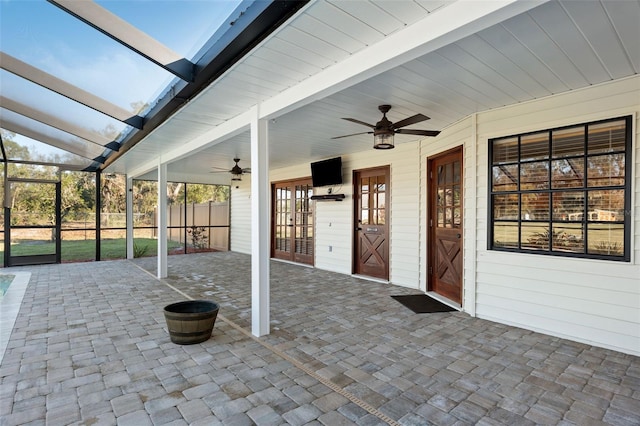 view of patio with french doors and ceiling fan