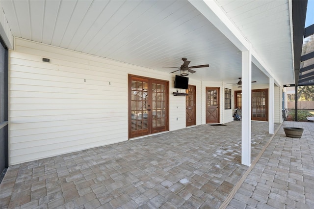 view of patio / terrace featuring ceiling fan and french doors