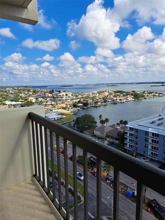 balcony featuring a water view