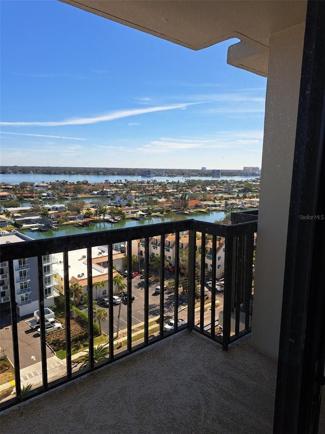 balcony featuring a water view