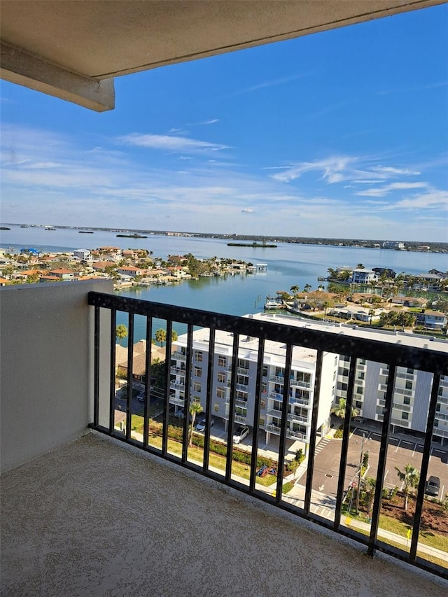 balcony featuring a water view