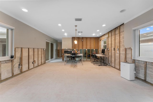 dining area featuring ornamental molding