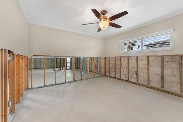 interior space with ceiling fan and ornamental molding