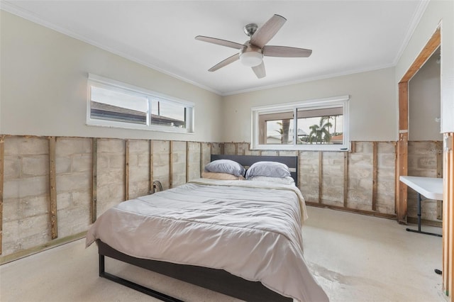 bedroom with crown molding and ceiling fan