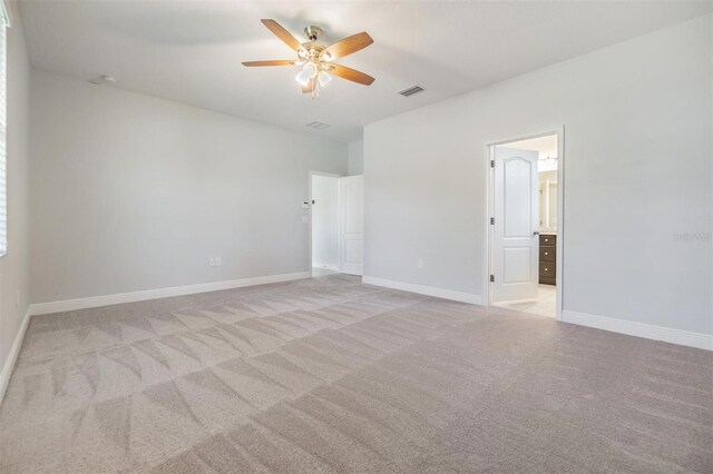 19724 Post Island Loop, Land O Lakes, FL 34638 - unfurnished room with light carpet, ceiling fan, and baseboards