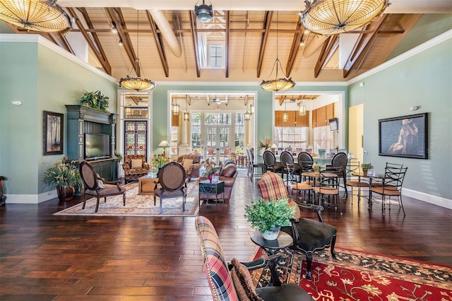 19724 Post Island Loop, Land O Lakes, FL 34638 - living area with baseboards, hardwood / wood-style floors, wooden ceiling with exposed beams, and high vaulted ceiling