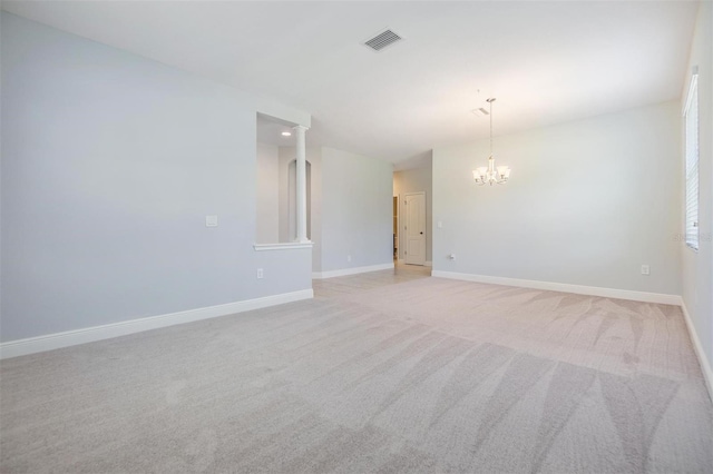 19724 Post Island Loop, Land O Lakes, FL 34638 - unfurnished room featuring a chandelier, light carpet, and baseboards