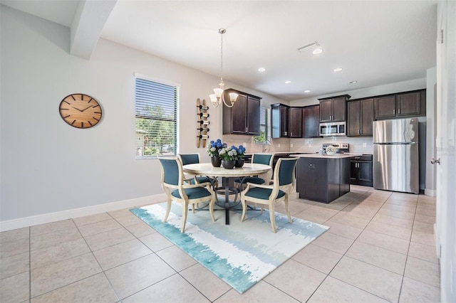 19724 Post Island Loop, Land O Lakes, FL 34638 - dining space with light tile patterned floors, a chandelier, and recessed lighting