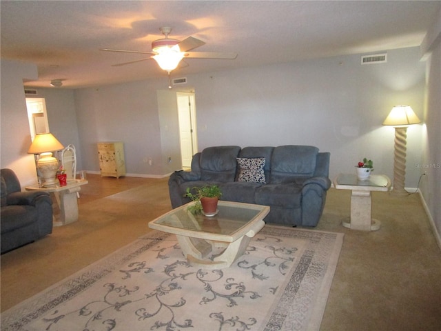 living room featuring ceiling fan