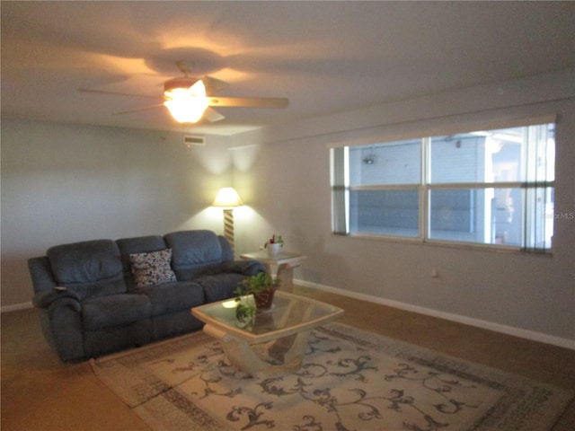 living room with ceiling fan