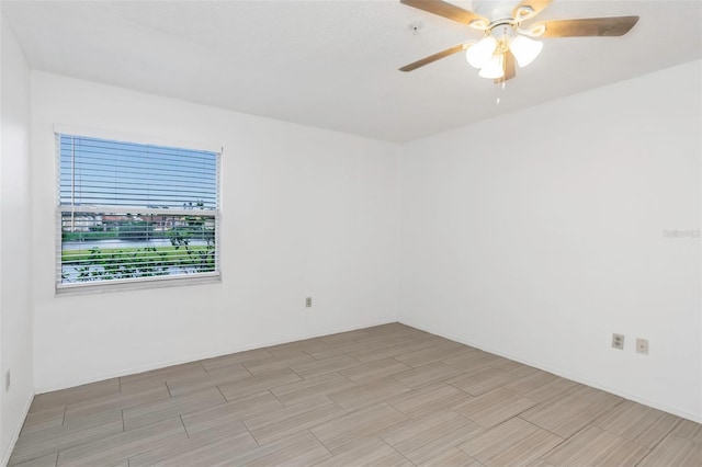 empty room featuring ceiling fan