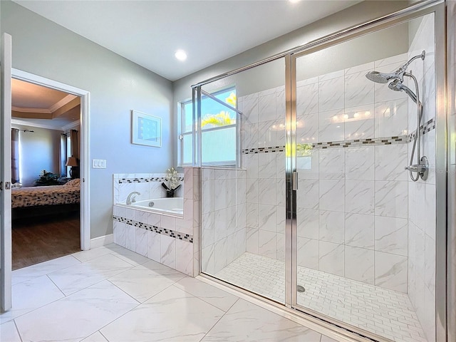 bathroom featuring plus walk in shower and ornamental molding