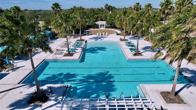 view of swimming pool featuring a patio area