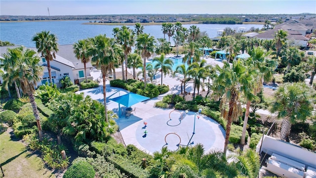 birds eye view of property with a water view