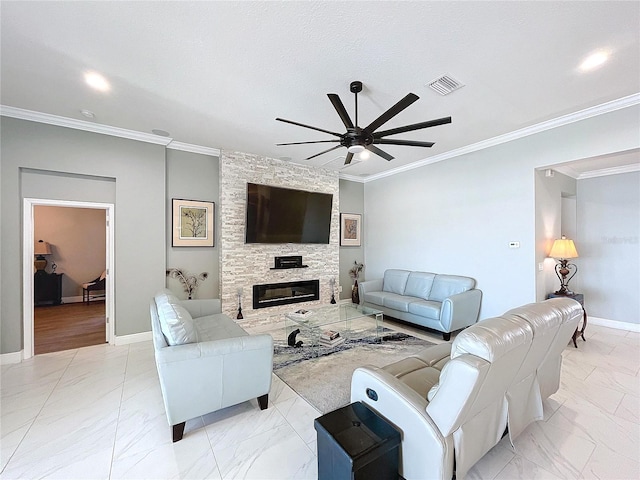 living room with crown molding, ceiling fan, and a stone fireplace