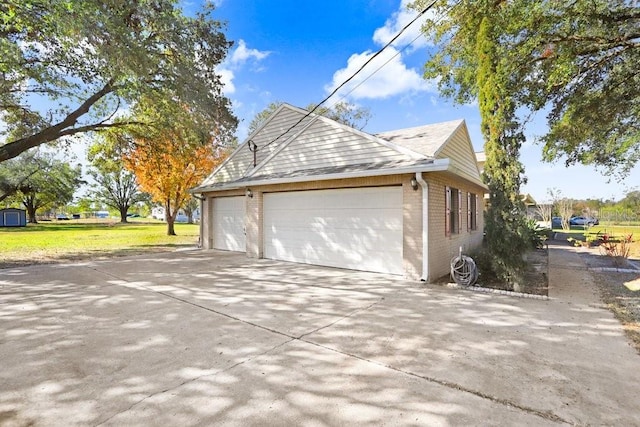 view of property exterior with a lawn