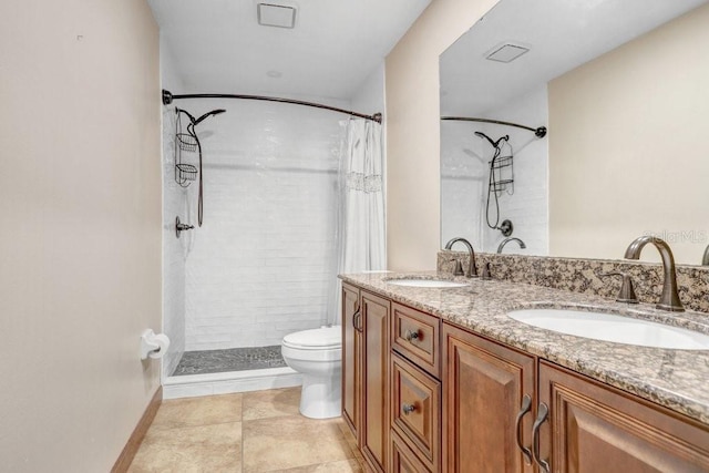 bathroom with vanity, tile patterned flooring, toilet, and a shower with shower curtain