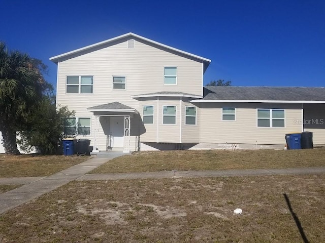 view of front of home featuring a front lawn