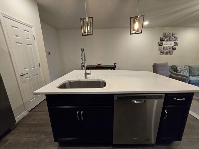 2878 Grand Kemerton Pl, Tampa, FL 33618 - kitchen featuring dishwasher, sink, pendant lighting, and an island with sink