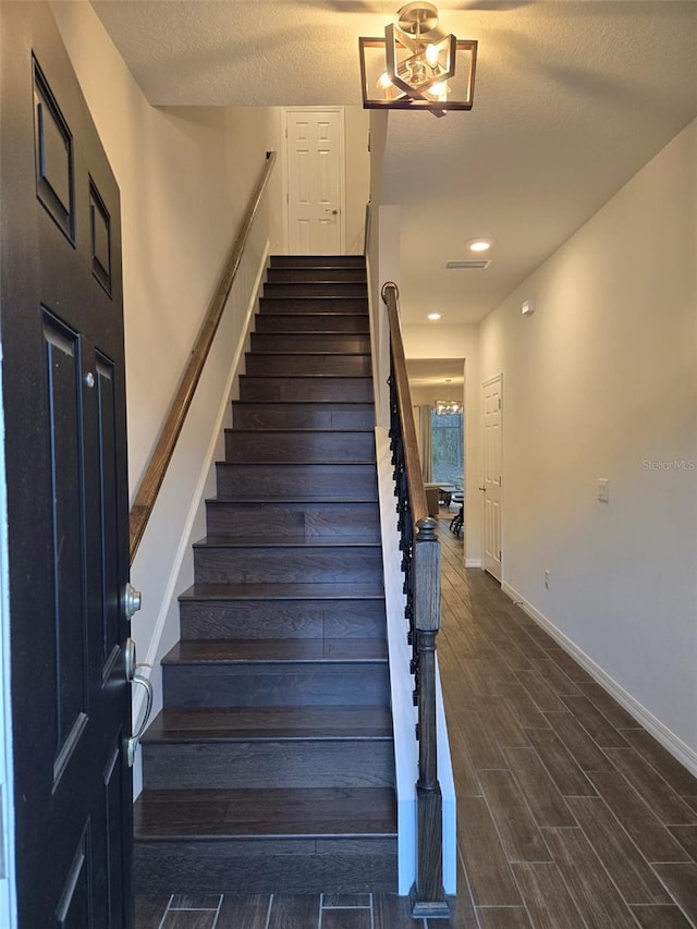 2878 Grand Kemerton Pl, Tampa, FL 33618 - stairway featuring a chandelier