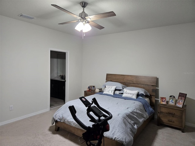 2878 Grand Kemerton Pl, Tampa, FL 33618 - carpeted bedroom featuring connected bathroom and ceiling fan