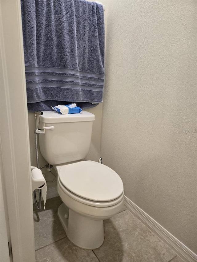 2878 Grand Kemerton Pl, Tampa, FL 33618 - bathroom featuring tile patterned floors and toilet