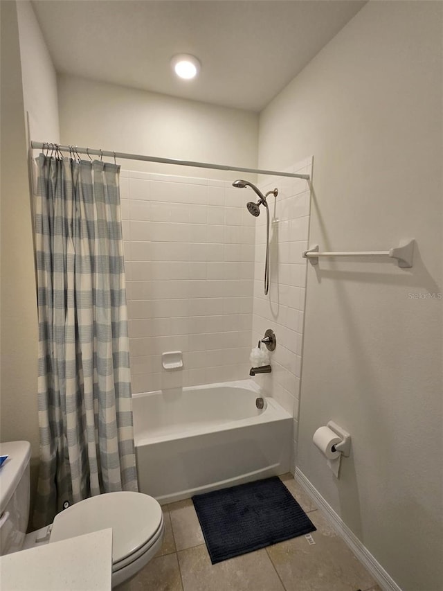 2878 Grand Kemerton Pl, Tampa, FL 33618 - bathroom with toilet, tile patterned flooring, and shower / bath combo