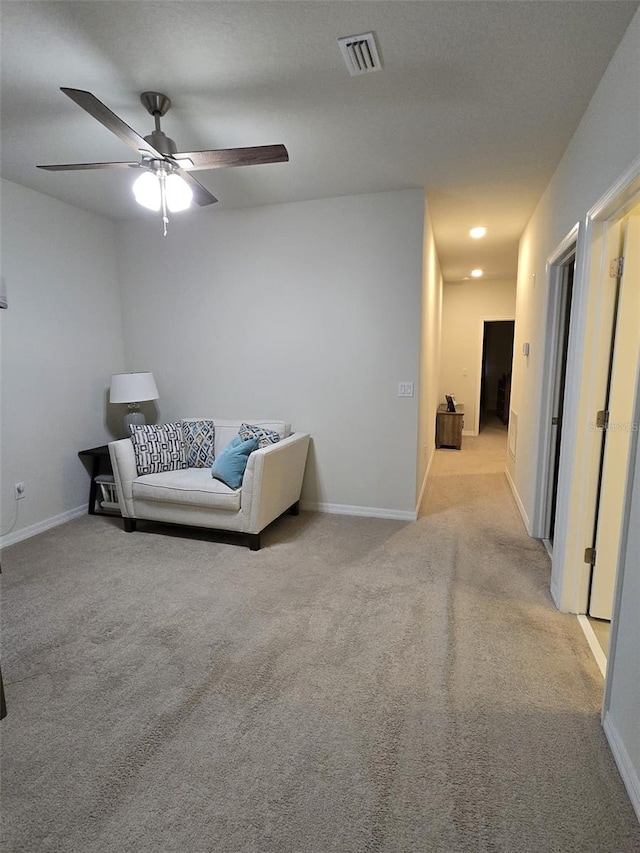 2878 Grand Kemerton Pl, Tampa, FL 33618 - living area featuring light colored carpet and ceiling fan