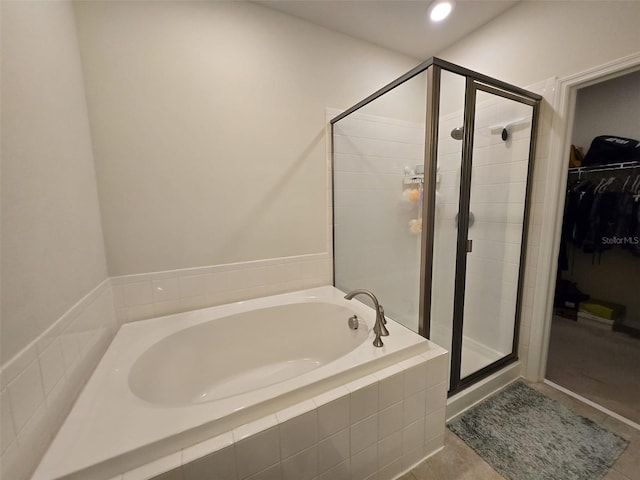 2878 Grand Kemerton Pl, Tampa, FL 33618 - bathroom with shower with separate bathtub and tile patterned floors