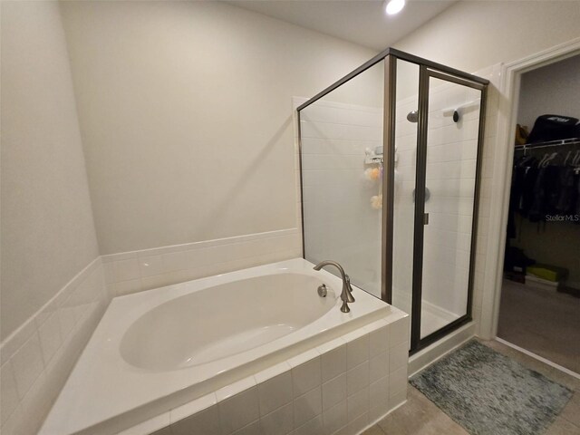 2878 Grand Kemerton Pl, Tampa, FL 33618 - bathroom with plus walk in shower and tile patterned flooring