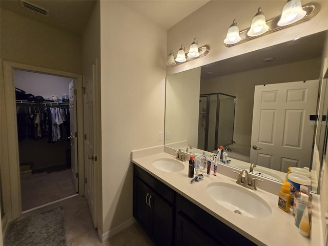 2878 Grand Kemerton Pl, Tampa, FL 33618 - bathroom featuring vanity, tile patterned floors, and shower with separate bathtub