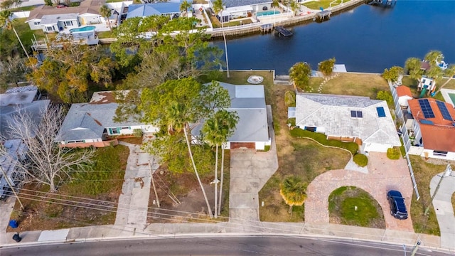 bird's eye view with a water view