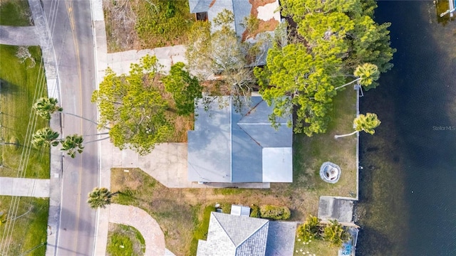 drone / aerial view with a water view