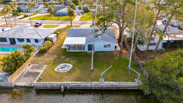 drone / aerial view with a water view