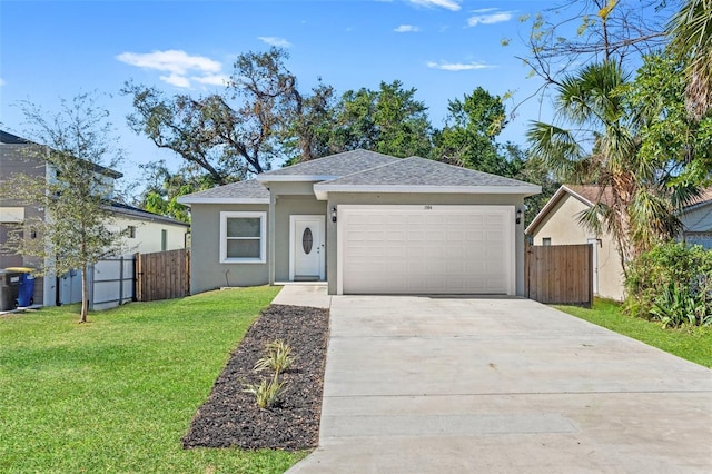 ranch-style house with a garage and a front lawn