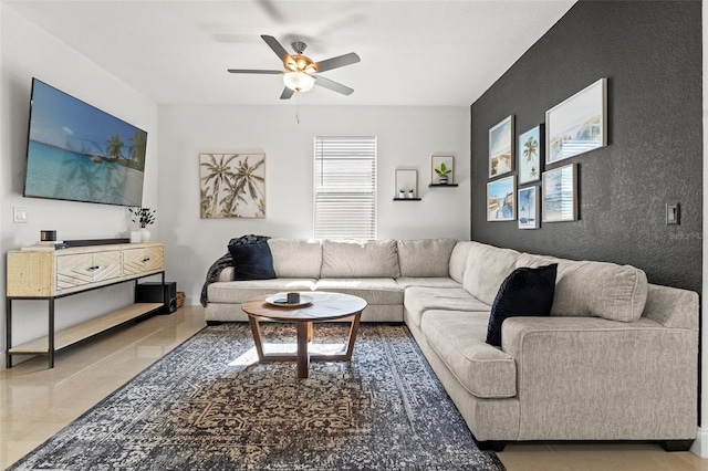 living room featuring light tile patterned floors and ceiling fan