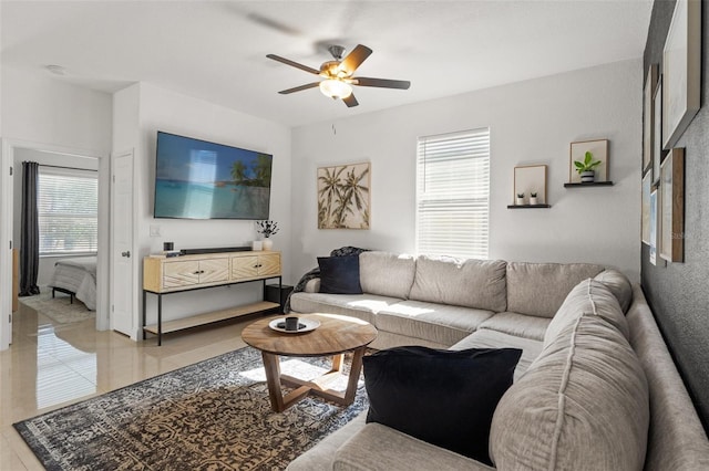 living room featuring ceiling fan