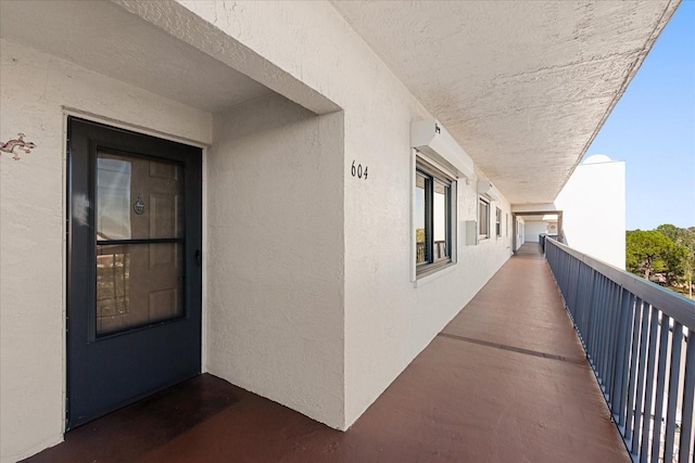 entrance to property with a balcony