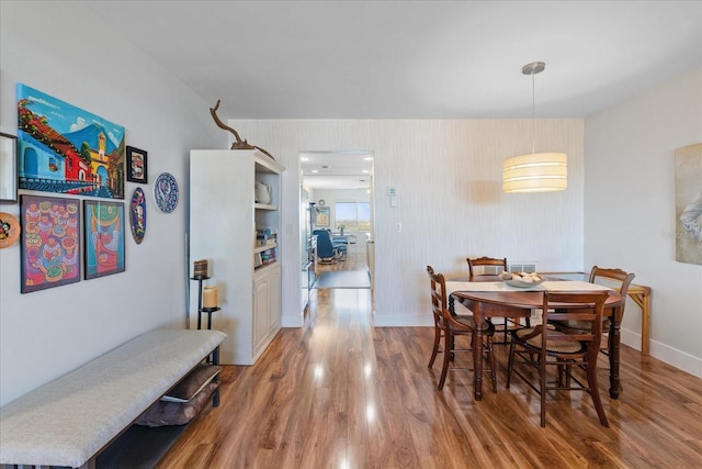 dining room with hardwood / wood-style floors