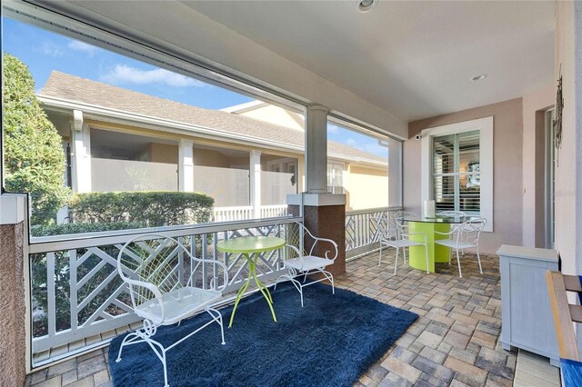 balcony with outdoor dining area