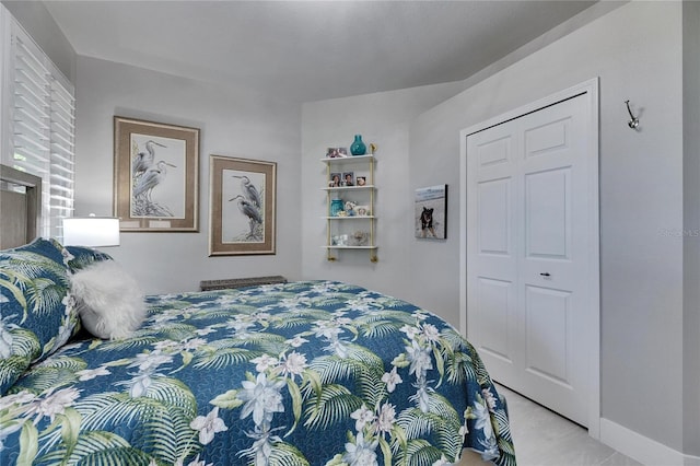 bedroom featuring baseboards