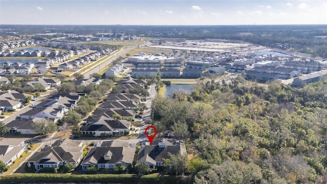 aerial view with a water view and a residential view