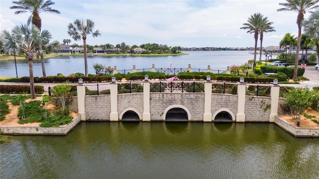 dock area with a water view