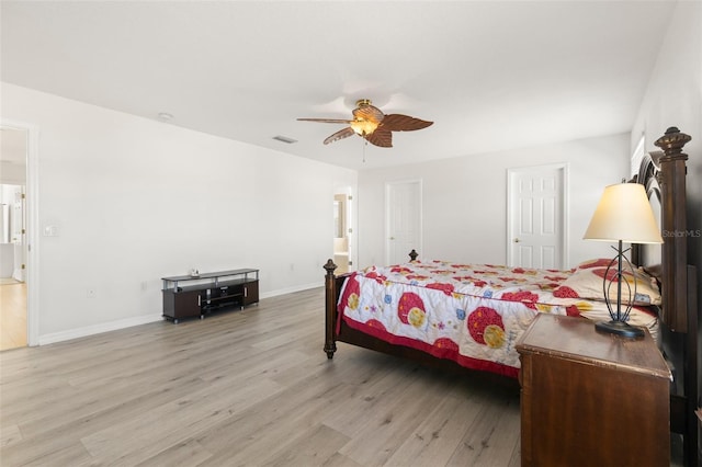 bedroom featuring light hardwood / wood-style flooring and ceiling fan