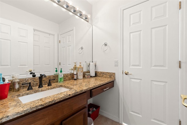 bathroom featuring vanity and tile patterned floors