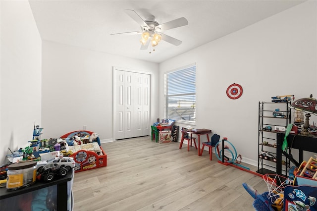 game room featuring ceiling fan and light hardwood / wood-style floors