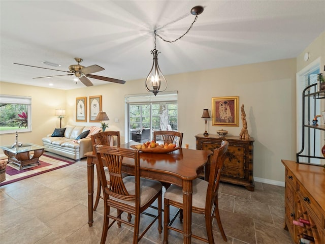 dining room with ceiling fan