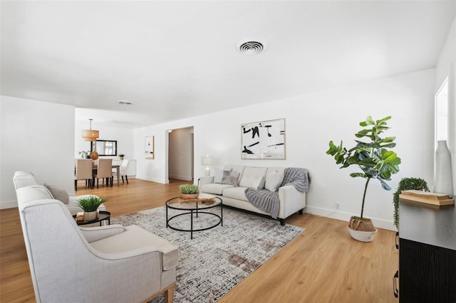 living room with hardwood / wood-style floors