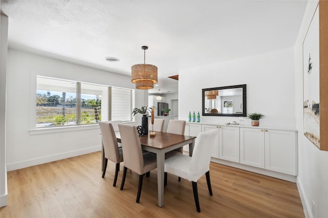 dining area featuring light hardwood / wood-style flooring