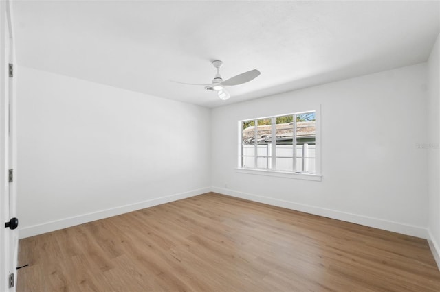 unfurnished room featuring ceiling fan and light hardwood / wood-style flooring